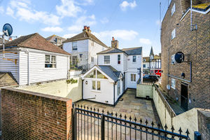 Rear paved garden- click for photo gallery